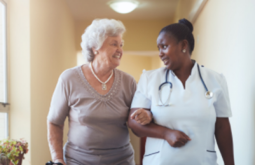 Nurse helping senior woman