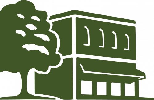 image of storefront building with oak tree to the side