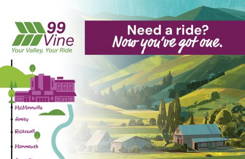99 Vine Transit bus driving through an idyllic valley road with green hillsides and sun shining.