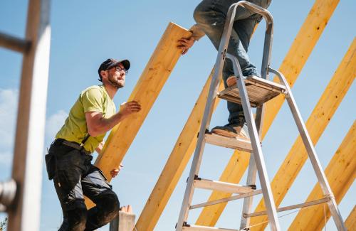 Construction workers doing roof work