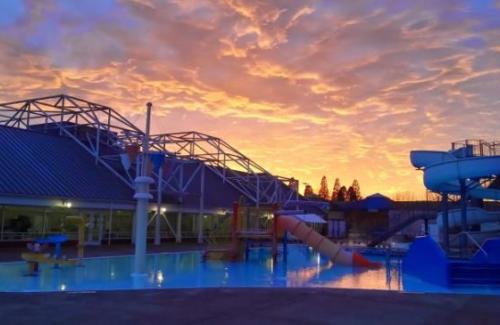 outdoor pool at sunset