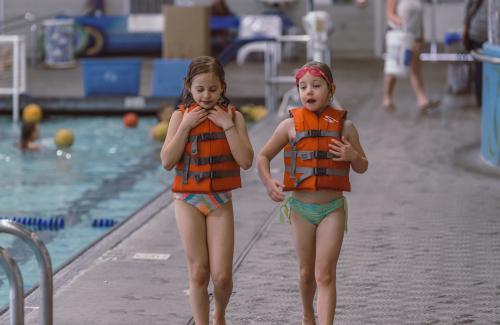 two girls wearing life jackets at osborn