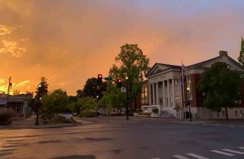 City Hall with orange sunset behind