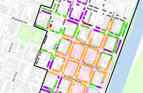 Map of downtown Corvallis with parking spaces marked with colored squares on the map.