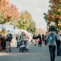 Shoppers strolling through downtown Corvallis on a sunny fall day. Photo by Verena Dohman