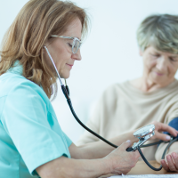 taking blood pressure