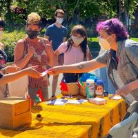 The Corvallis Multi-Cultural Literacy Center welcomes attendees to a drive/walk/bike through event hosted at the center.