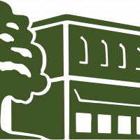 image of storefront building with oak tree to the side
