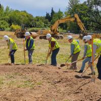 Groundbreaking in Avery Park Corvallis City Councilors wearing yellow vests and hard hats at a groundbreaking ceremony for the new Park Maintenance Facility.