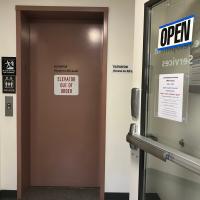 Elevator with "Closed" sign posted
