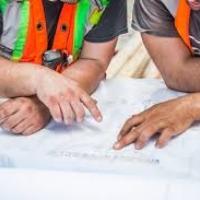 Contractors reading plans