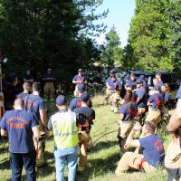 Corvallis Firefighters meeting outdoors before a training exercise.