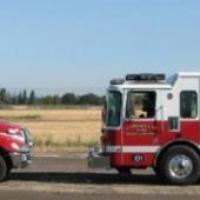 fire truck and a ambulance on the road