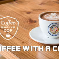 A cup of coffee with the Corvallis Police logo and a graphic image of a badge that says coffee with a cop
