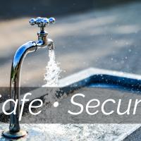 water pouring out of an outdoor spigot