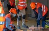 Participants practice search and rescue techniques to rescue a mannequin.