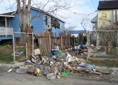 Solid waste in front of home