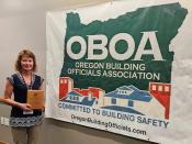 Priscilla Holding Permit Technician of the Year Award