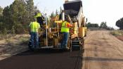 Construction crew doing paving road work