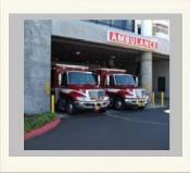 ambulance parked in front of a hospital