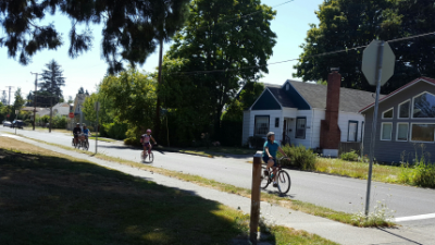bicyclists ride around the Jobs Addition Neighborhood.