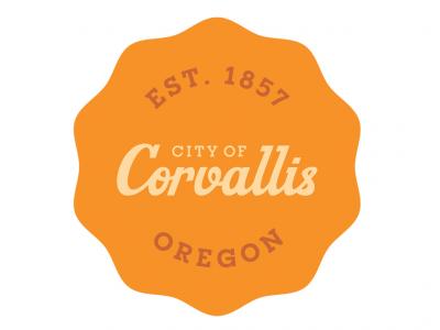 Medallion in dark yellow with the word corvallis written in cursive