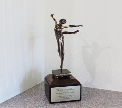 Bronze ballerina statue on a marble plinth