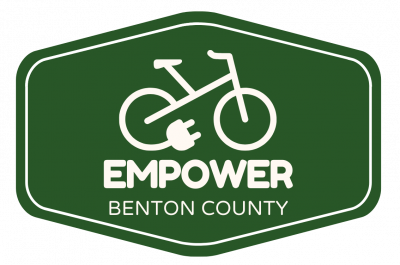 Empower Benton County green banner showing an e-bike with a plug-in cord