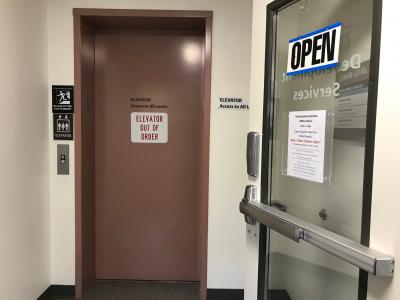 Elevator with "Closed" sign posted