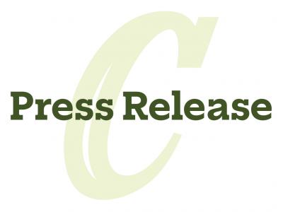 Decorative graphic with "Press Release" over a C monogram