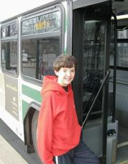 Kid getting on the bus