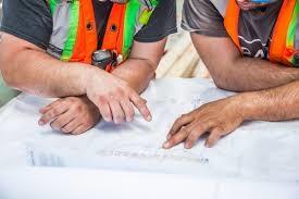 Contractors reading plans