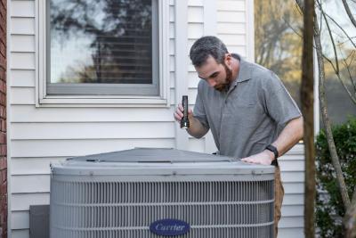 Inspector inspecting HVAC system