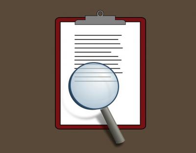 Magnifying Glass on Clipboard Graphic