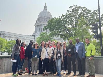 New Mayors Cohort 2023, standing in front of the capital dome in Madiscon, Wisconsin