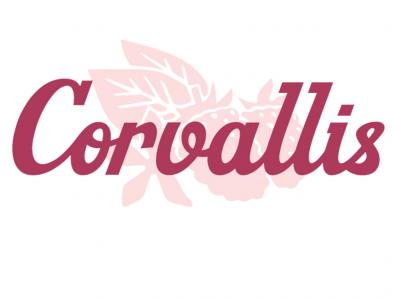 Corvallis wordmark in purple over an image of a blackberry