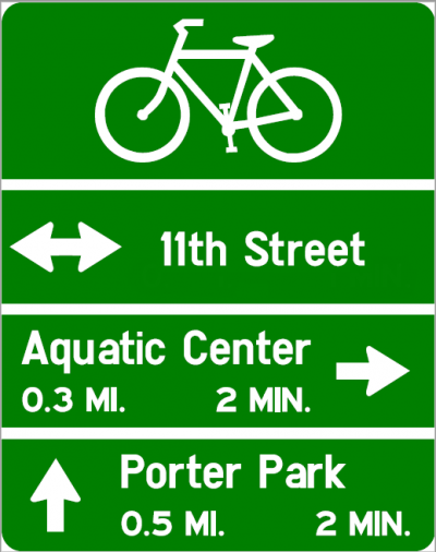 Bicycle Guide Sign Example: Bike Path Left & Right for 11th St; Aquatic Center 0.3 miles Right; Porter Park 0.5 miles Straight