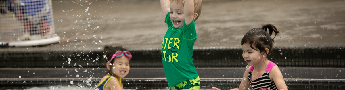 toddlers playing indoor pool