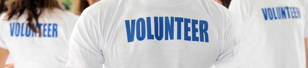 people with volunteer t-shirts 