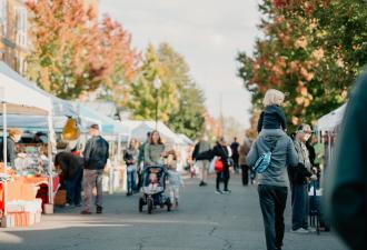 Shoppers strolling through downtown Corvallis on a sunny fall day. Photo by Verena Dohman