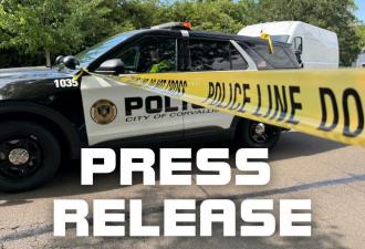 CPD Press Release Corvallis police car with yellow caution tape attached to the window.