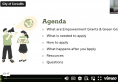 Video screenshot showing the agenda for the grant webinar along with two decorative graphics of people making an announcement.