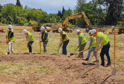 Groundbreaking in Avery Park Corvallis City Councilors wearing yellow vests and hard hats at a groundbreaking ceremony for the new Park Maintenance Facility.