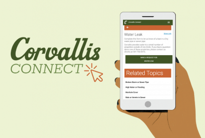 Hand holding mobile phone with Corvallis Connect green script logo