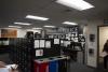 Cluttered police station with desks and file cabinets